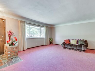 Inviting entry with slate floor and guest closet. 