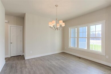 Dining Room/Flex Space has Large Windows Overlooki