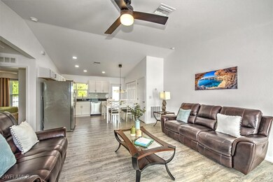 Living area featuring wood finished floors, ceilin