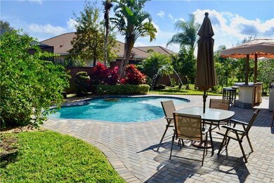 Backyard oasis with Mediterranean-style pool, outd