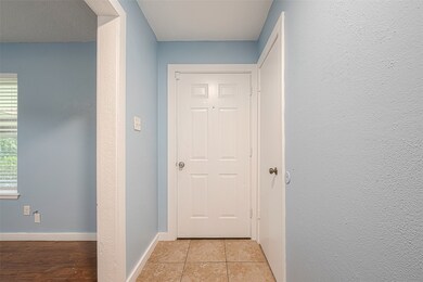 Step into a bright entryway with the dining area j