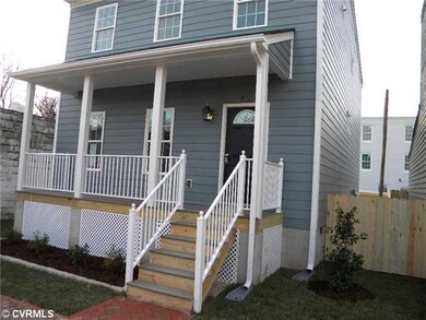 Exterior Front - Landscaped front yard and cobble 