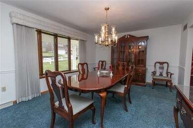 Freshly painted dining room features a lovely bow 