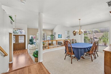 Formal dining room and double door entry into home
