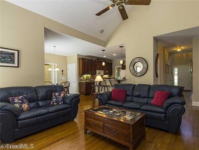 Den/Family/Great Room. Hardwood floors throughout living area. Cathedral ceilings.