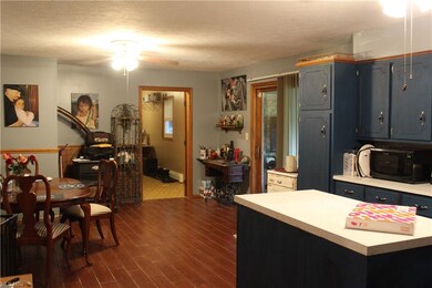 Large eat-in kitchen with newer ceramic floors