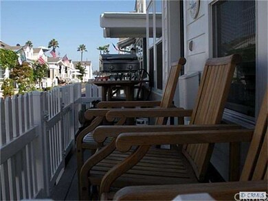 FRONT PORCH WITH VINYL UPGRADED FENCING AND GATE