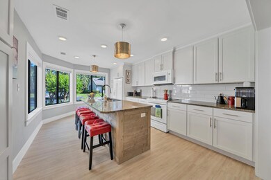 This stunning kitchen has updated cabine
