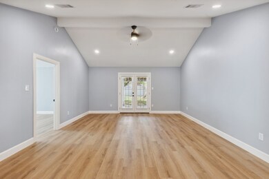 Huge living room open to dining room