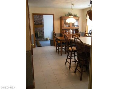 Kitchen has breakfast bar and beautiful view of fi