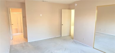 Primary bedroom towards bathroom