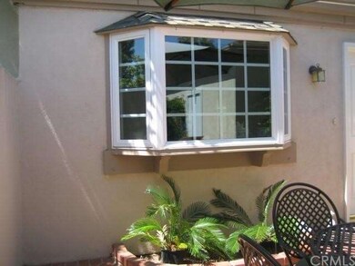 Your kitchen bay window overlooks the front patio.