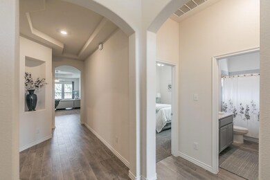Corridor featuring dark wood-type flooring