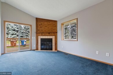 Cozy living room with a wood burning fireplace and
