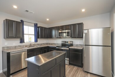 Stainless steel appliances and brand new dishwasher 