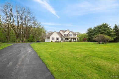 Your new home sits deep into a 5 acre lot