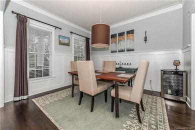 Dining Room with shaker style wainscoting and crow