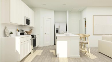 Kitchen with light wood-type flooring, a breakfast
