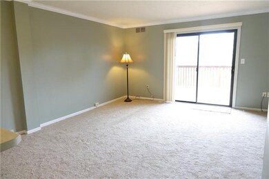 Spacious Living Room with newer carpeting, crown m
