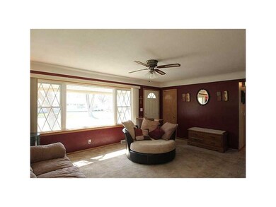 Living Room. Nice large window in living room allo