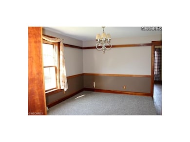 Nice sized formal dining room measures 13x14.