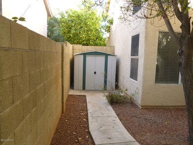 Side yard with storage shed