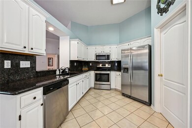 VIEW OF KITCHEN  STAINLESS APPLIANCES