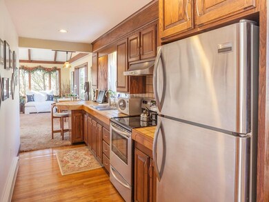 With beautiful wooded cabinetry,...