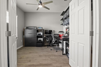 Room on the left as you enter is the den/home office