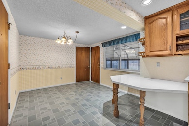 3428 S Oquirlane St, Magna, UT 84044 - photo 4