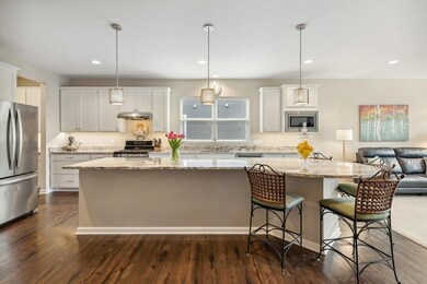 To the left is a walk in pantry and separate prep space