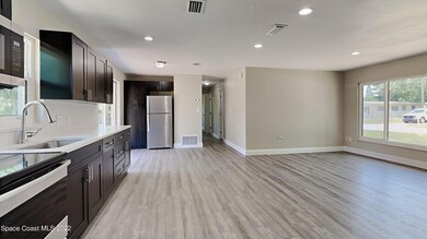 1724 White St, Titusville, FL 32796 - photo 6