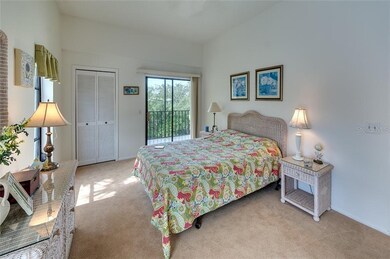 Sliders to lanai from master bedroom.
