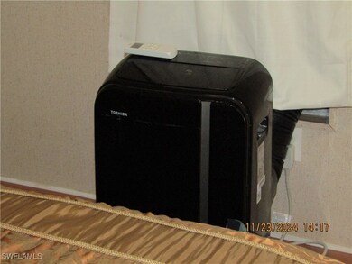 portable AC unit in bedroom