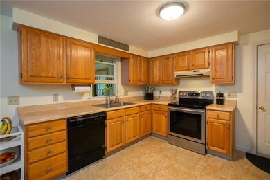 Kitchen has another set of cabinets...