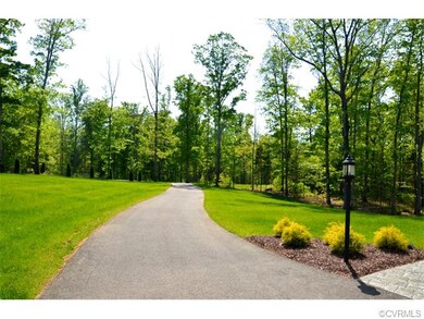 Long private drive is a nice entrance to your new 