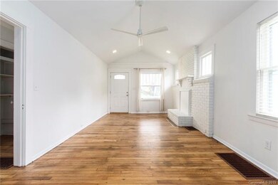 Bright Living Room with Vaulted Ceiling