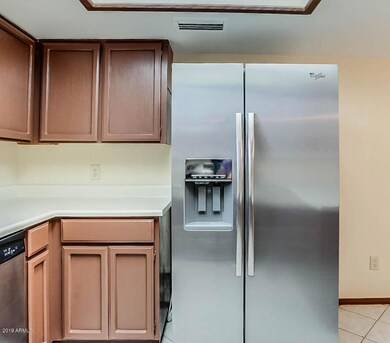 Kitchen with SS fridge