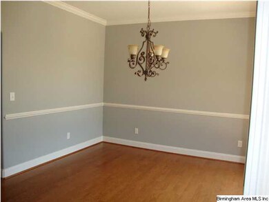 Dining room with wood floors.