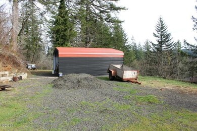 Newer 2-car carport, well pump inside