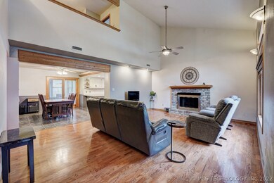 Living Room with vaulted ceiling and cozy fireplac