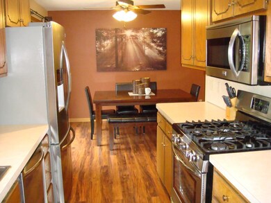 Kitchen new stainless appliances, flooring and lig