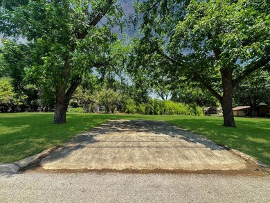 View of street with view of scattered trees