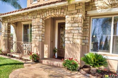 Leaded glass entry door with stamped concrete entr