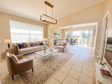 Living room featuring light tile patterned floorin
