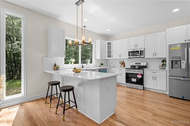 Kitchen with appliances with stainless steel finis