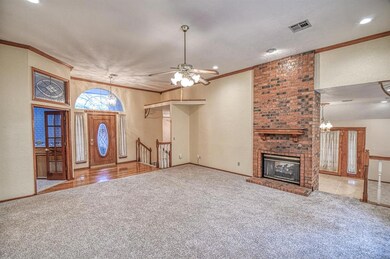 Double sided gas log fireplace.