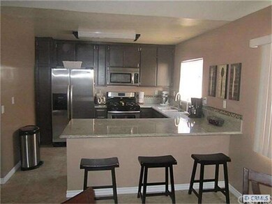 REMODELED KITCHEN WITH NEW APPLIANCES AND GRANITE 