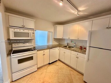Granada Dadeland unit 312W, Miami, FL 33143 - photo 2