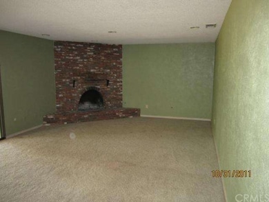 Living Room with Brick Fireplace